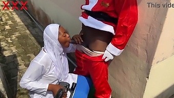 Sexy Hijab-Clad Babe Enjoys Christmas With Santa. Subscribe For More.