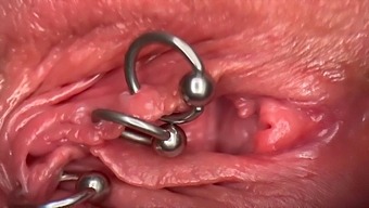 Intense And Up-Close View Of A Pierced Clit And Pussy Getting Wet And Peeing