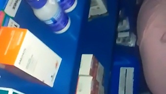 Intimate Encounter At The Pharmacy Amidst Various Medications